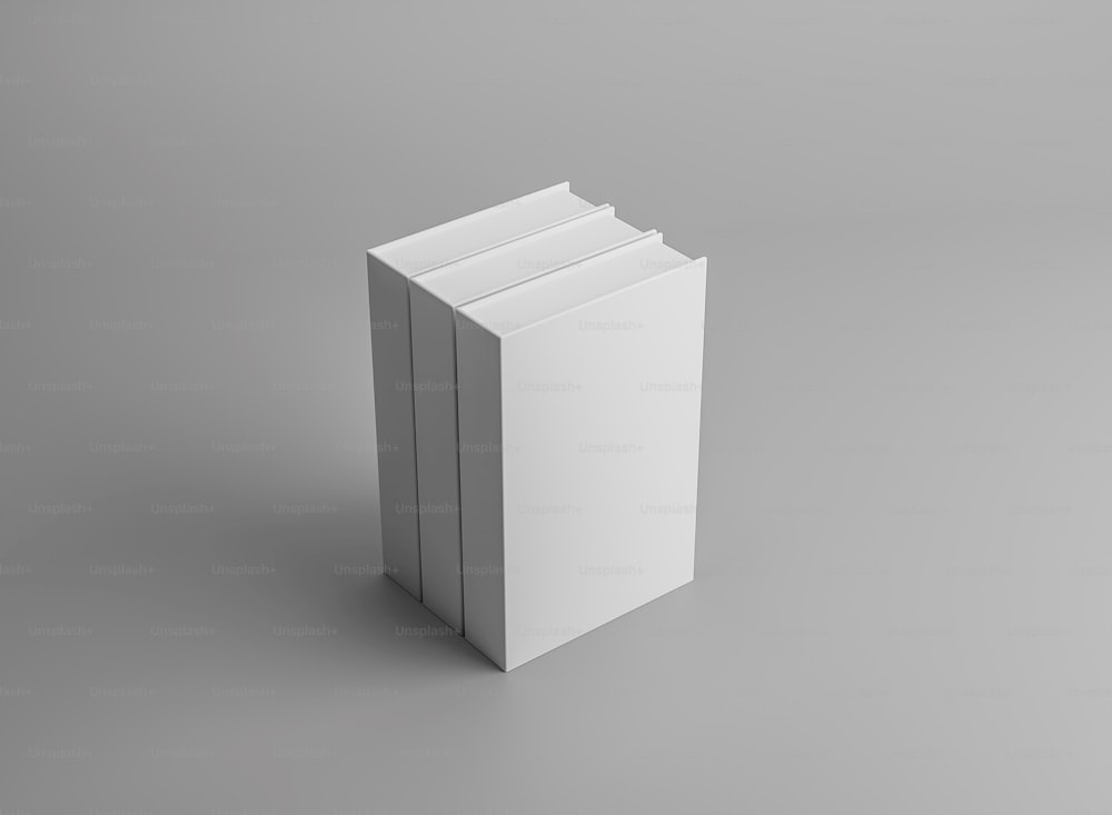 uma caixa branca com três lados em um fundo cinza