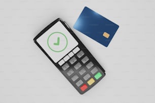 Una calculadora y una tarjeta de crédito en una mesa
