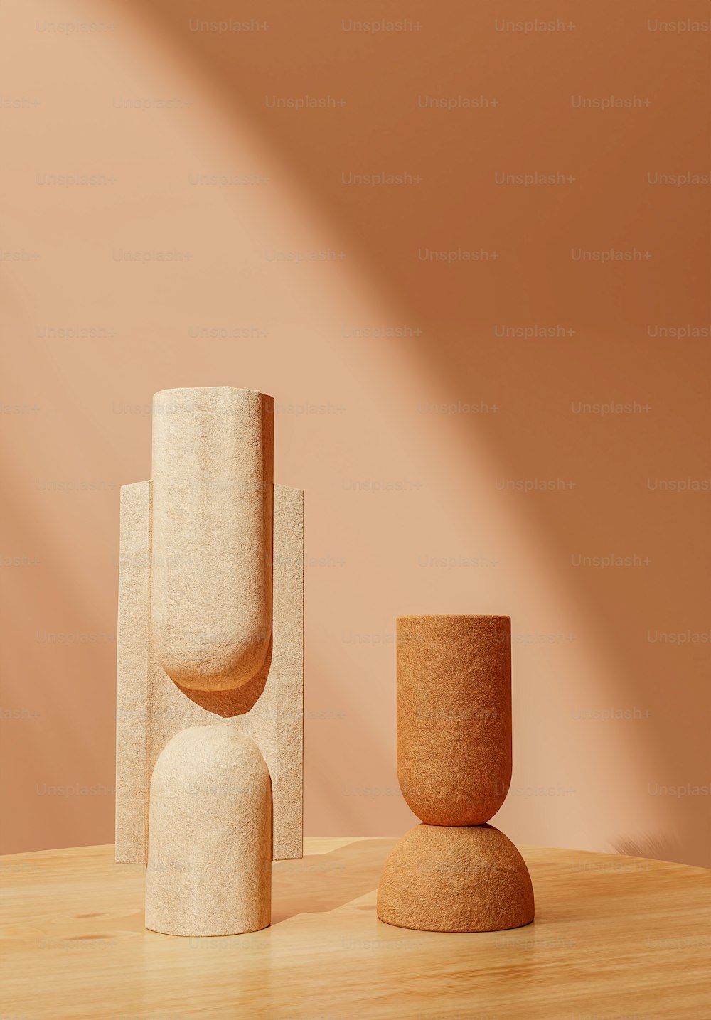 a couple of vases sitting on top of a wooden table