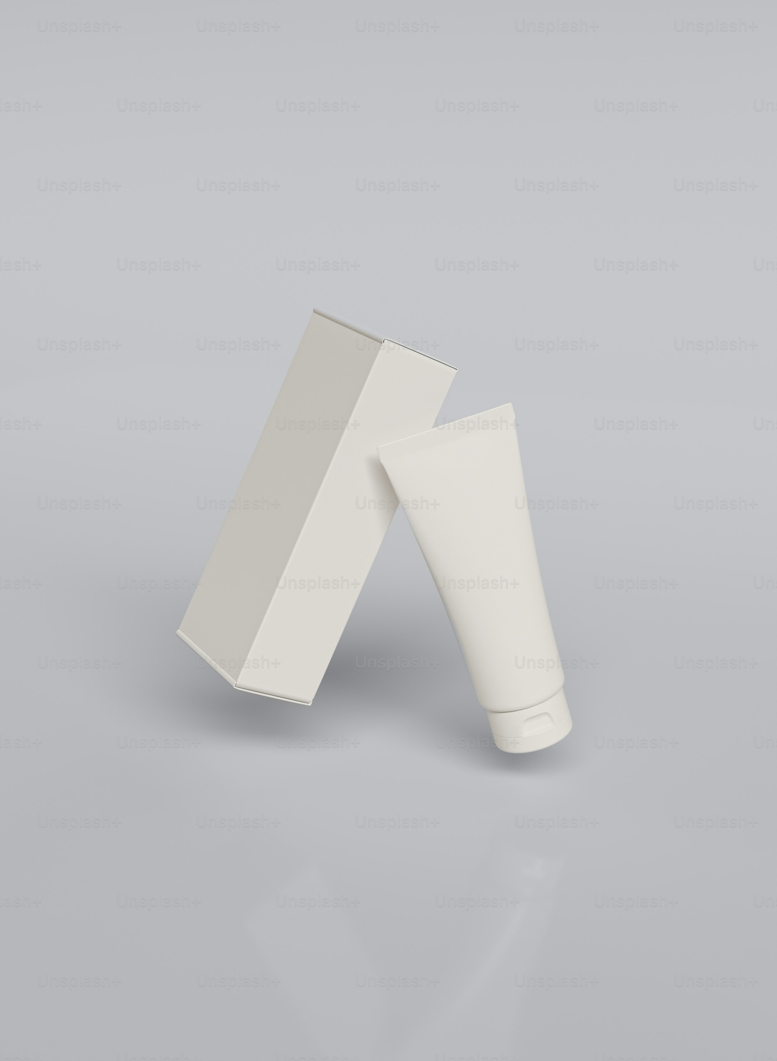 a white tube of toothpaste on a gray background