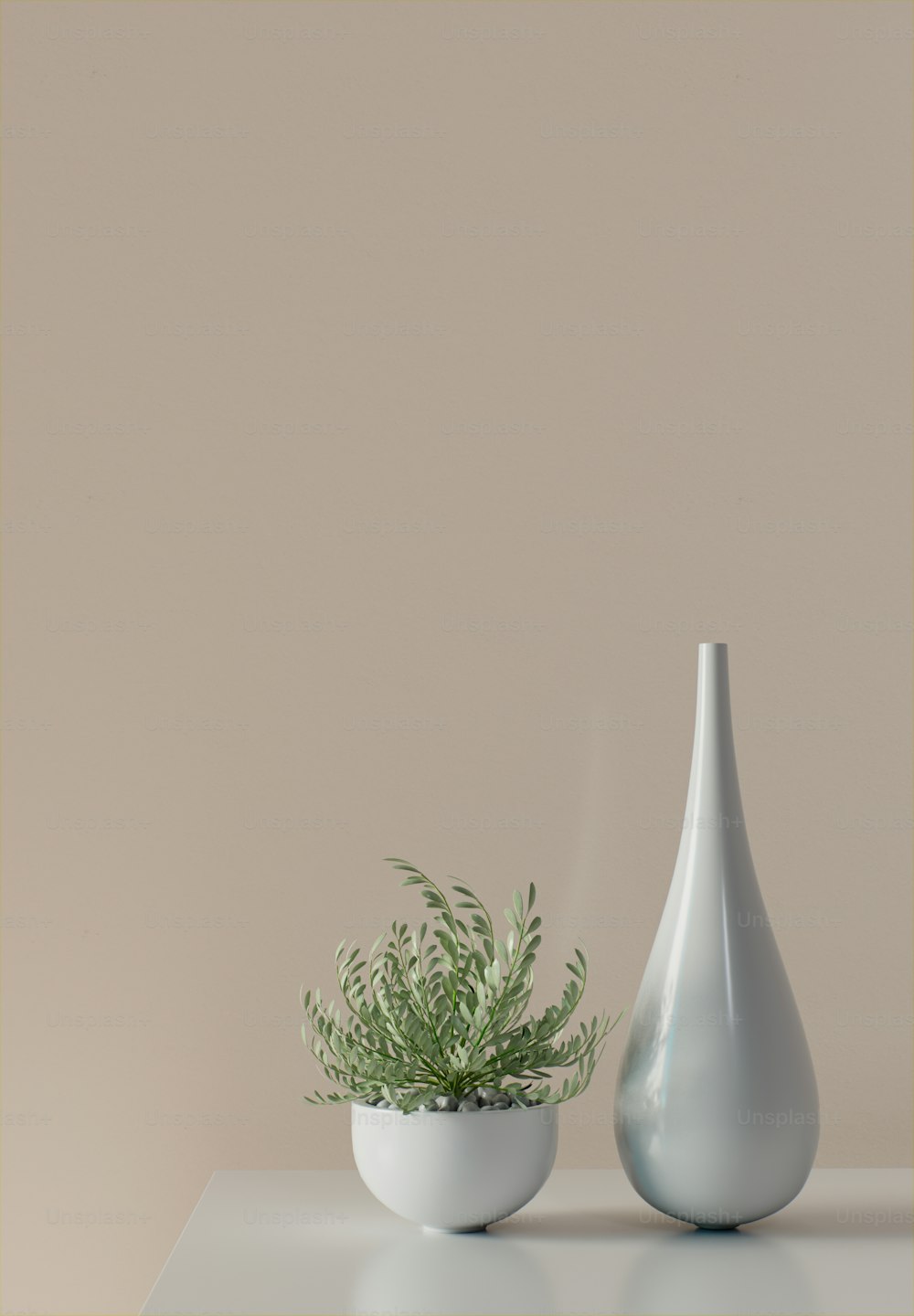a white vase with a green plant in it