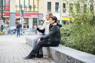 Hapy couple is having date in the street of city