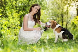 Portrait of a woman with her beautiful dog outdoors