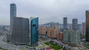 a view of a city with tall buildings