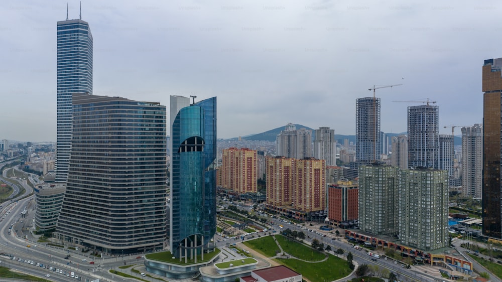 a view of a city with tall buildings