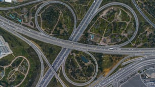 an aerial view of a highway intersection with multiple lanes
