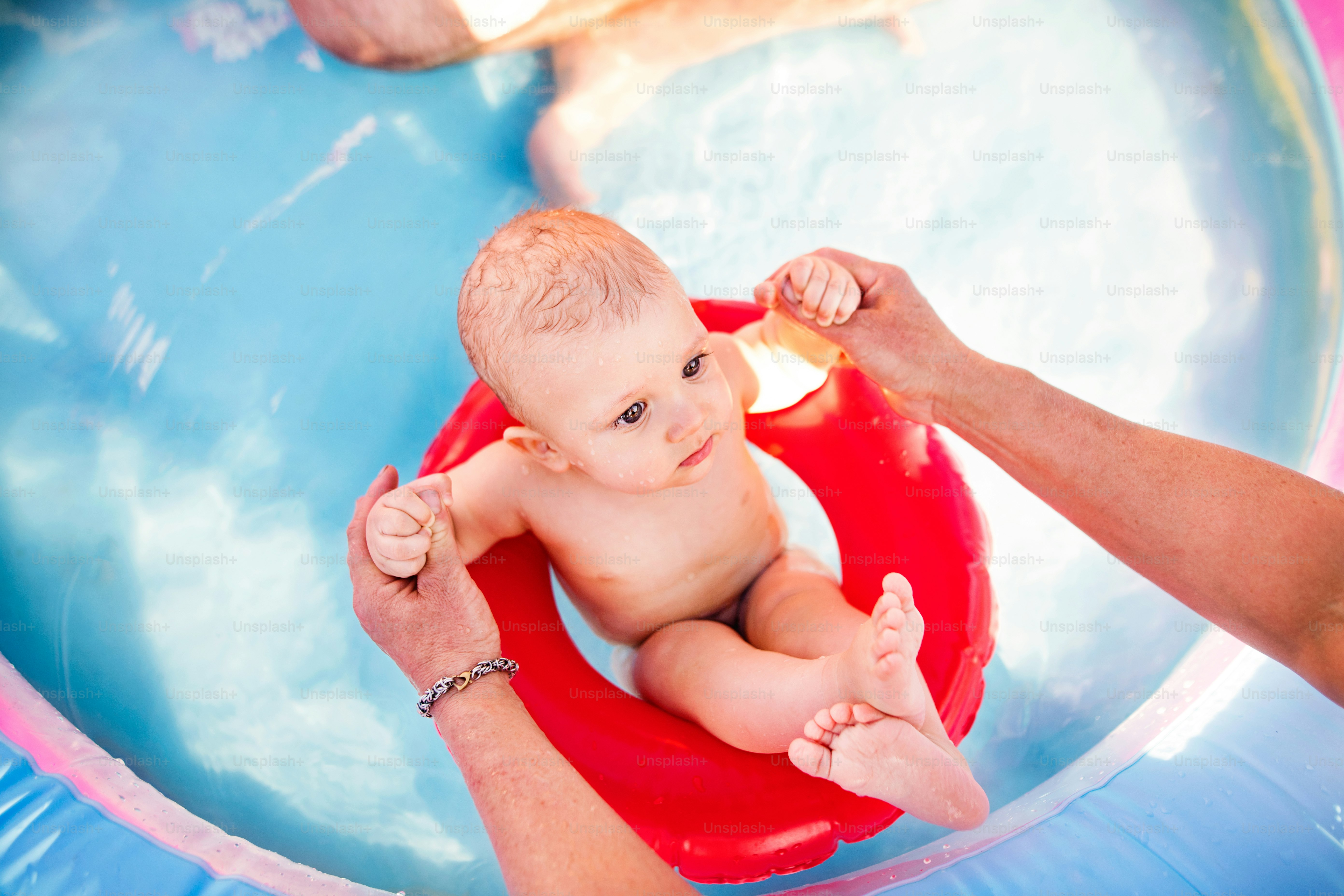 Baby home swimming lesson at private pool