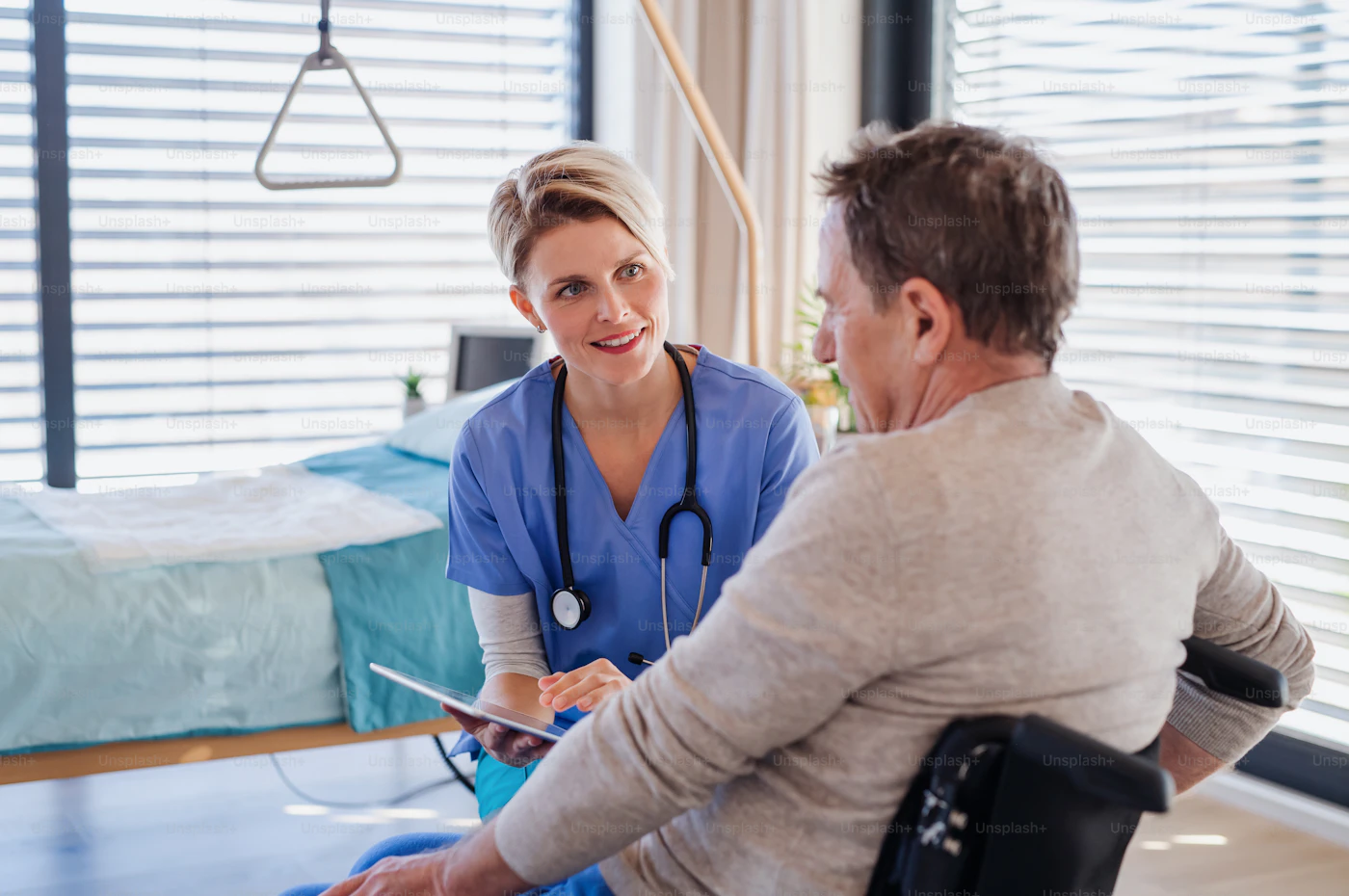 A community nurse talking with a patient