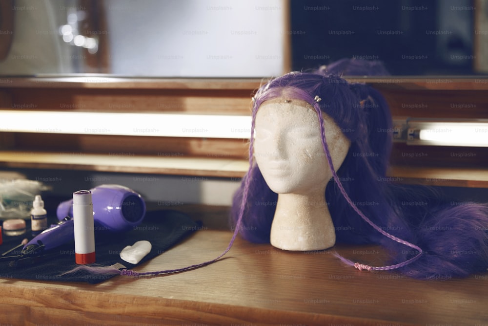 a wig sitting on top of a wooden table