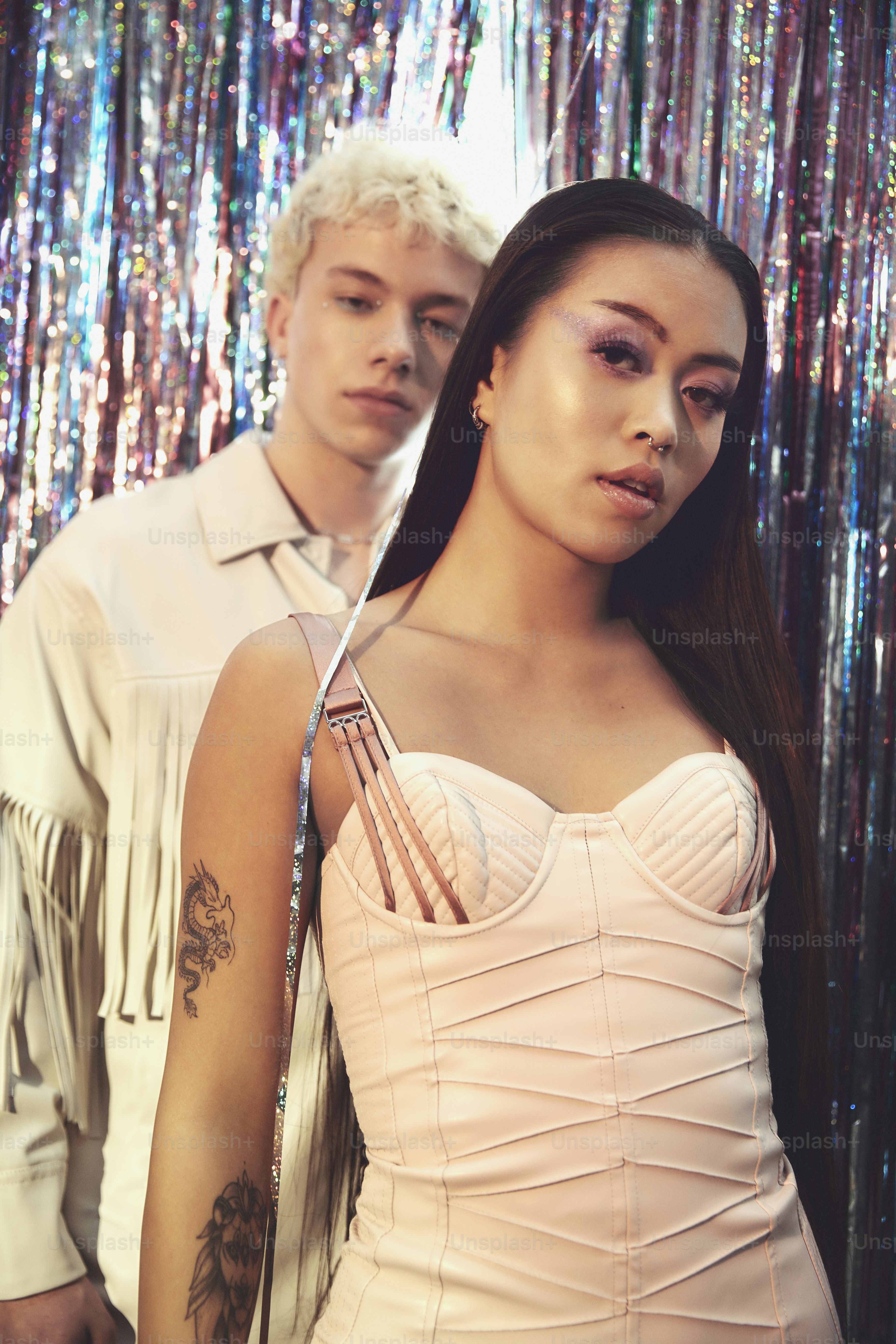 a man and a woman standing next to each other