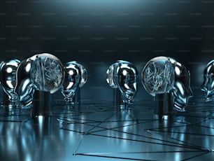 a group of shiny silver objects sitting on top of a floor