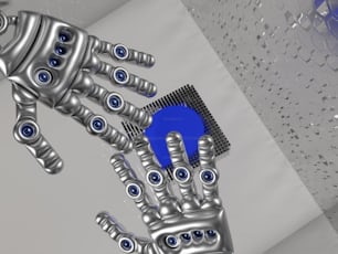 a robot hand holding a blue object in the air
