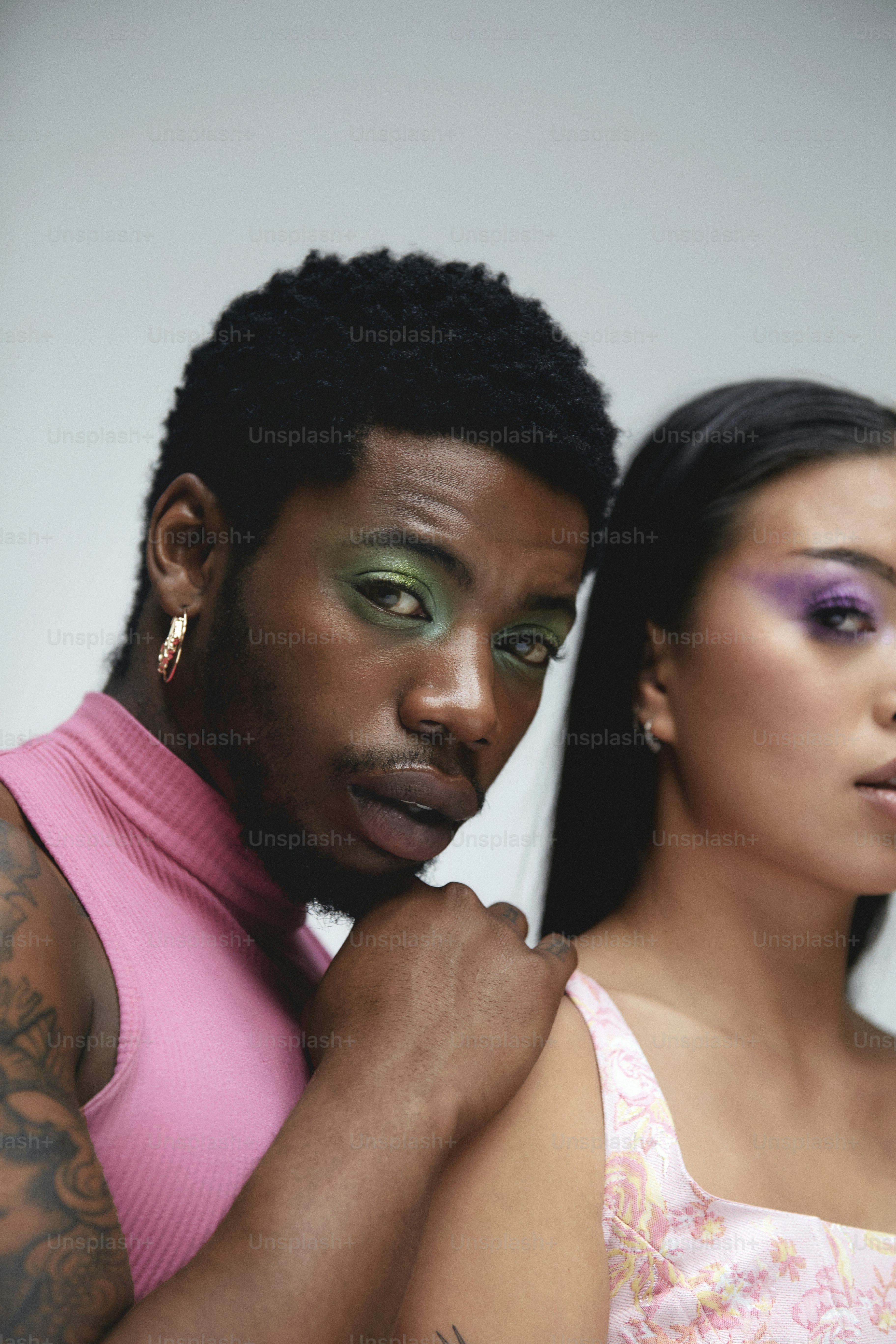 A man and a woman posing for a picture photo – Fashion Image on Unsplash