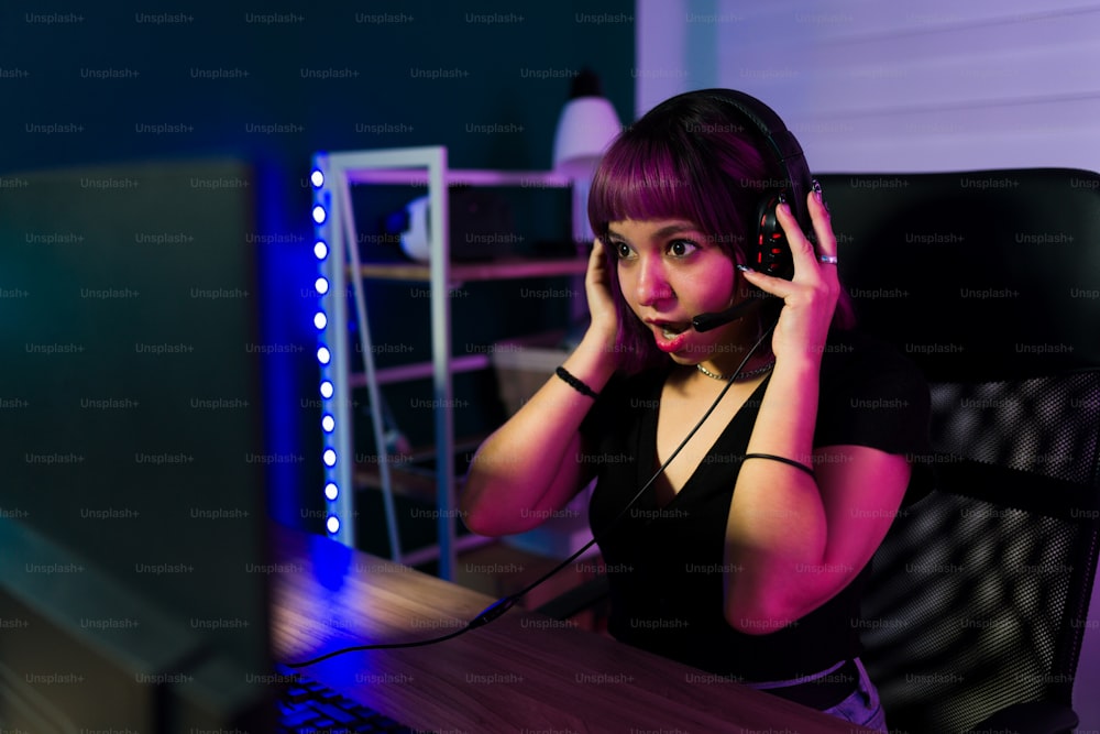 Wow! Hispanic female gamer can't believe she is the winner at a video game competition