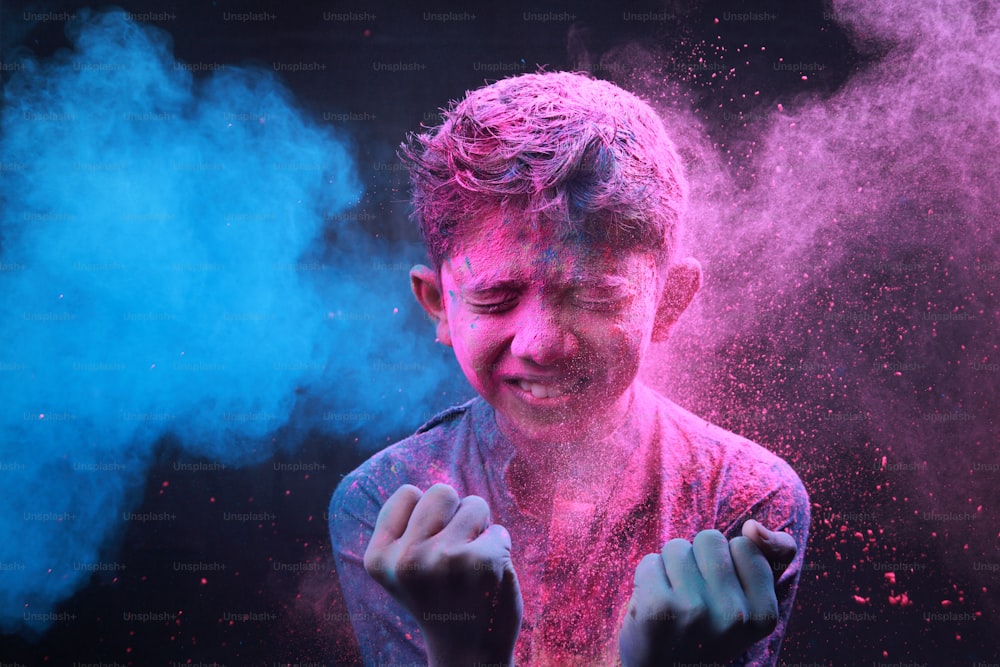Holi Powder Blowing Up On Black Background Stock Photo - Download Image Now  - Abstract, Ash, Backgrounds - iStock