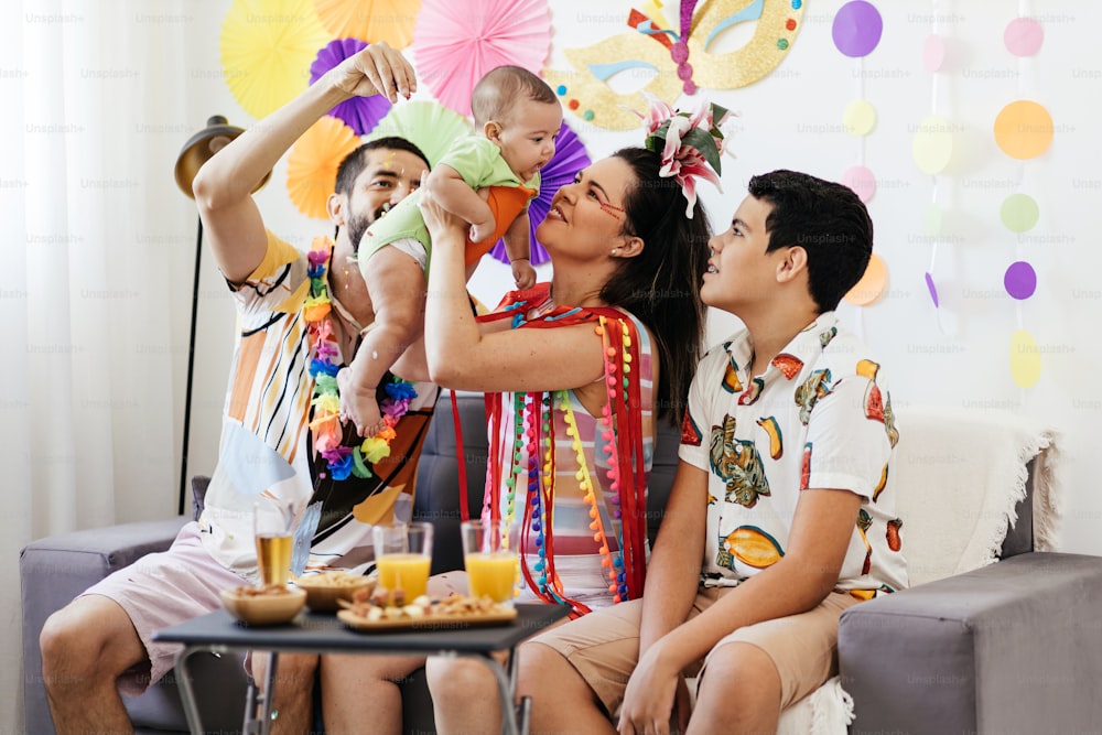 Brazilian Carnival. Family celebrating carnival at home