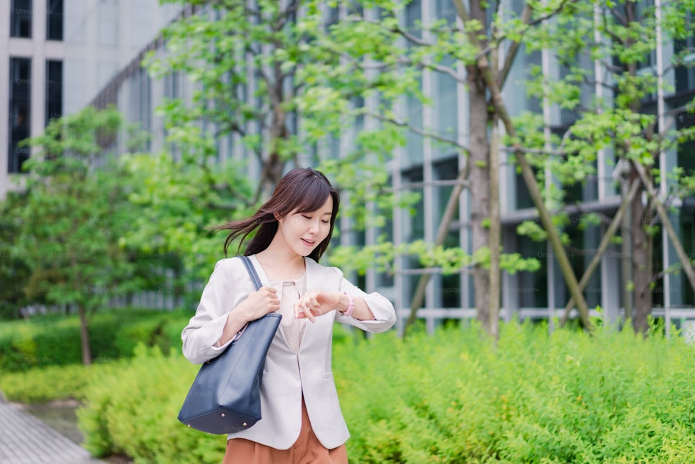 Young businesswoman going to office