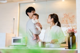 Young families sharing childcare and household chores