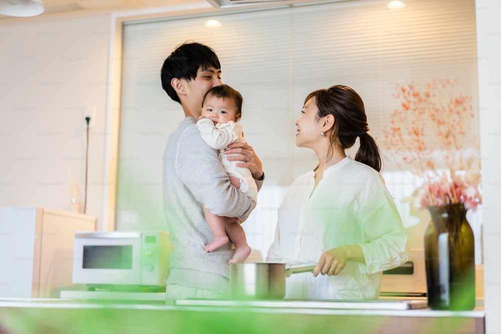 Young families sharing childcare and household chores