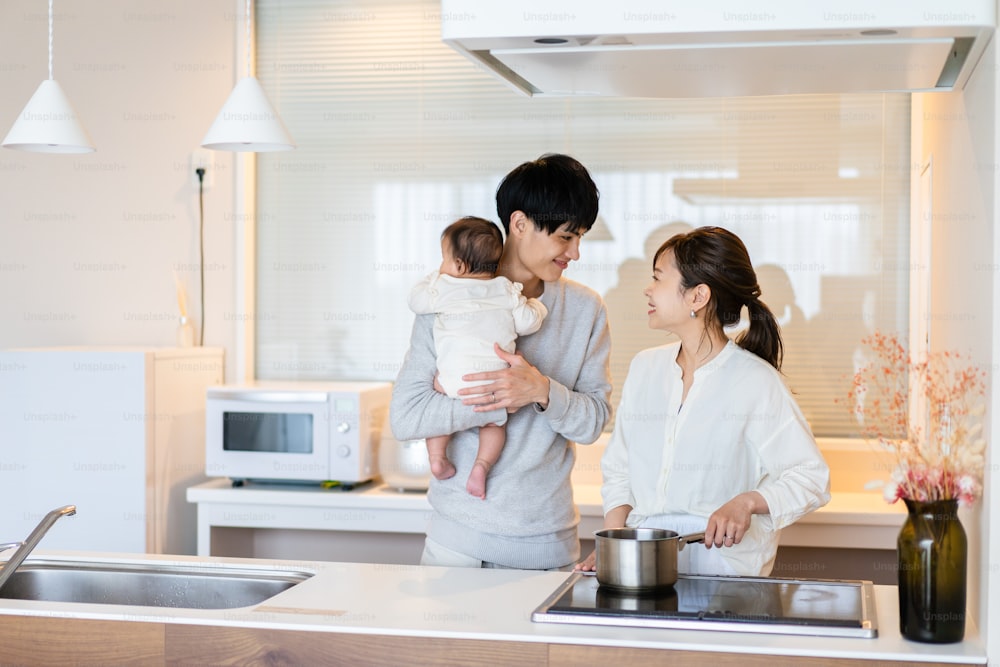 Young families sharing childcare and household chores