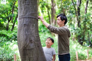 Parents and children catching bugs