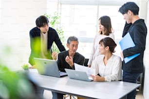 Business persons working in an office