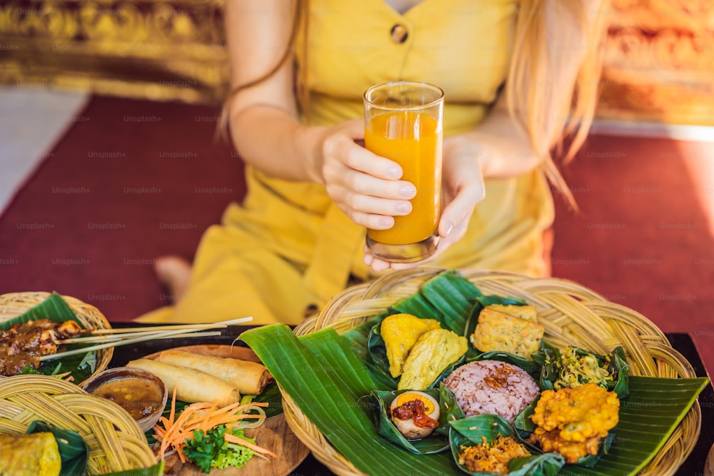 Jamu. Traditional medicine and herbal drink in Indonesia, most prevalent in Java. Made from natural materials, such as parts of plants such as roots, bark, flowers, seeds, leaves and fruits.