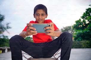Indian Cute Little Boy With Cellphone