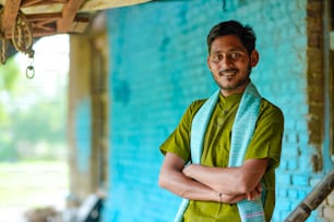 Indian farmer in traditional wear at home.