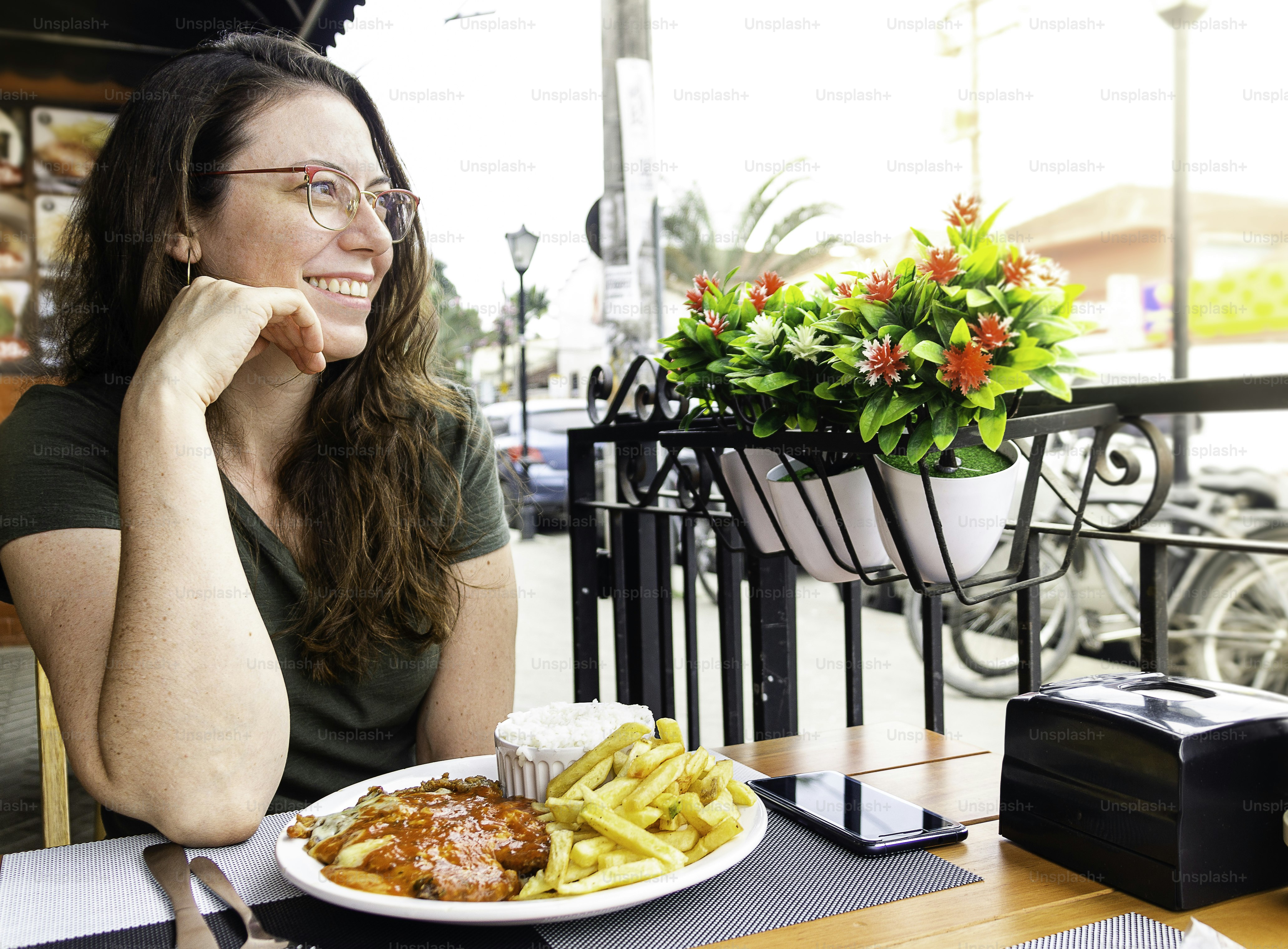 Beautiful model sitting in restaurant for lunch.