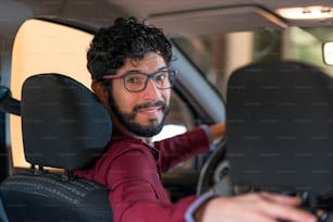 Portrait of a smiling driver. Travel concept.