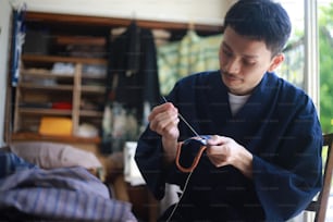 Men sewing