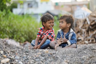 indian poor child playing at home