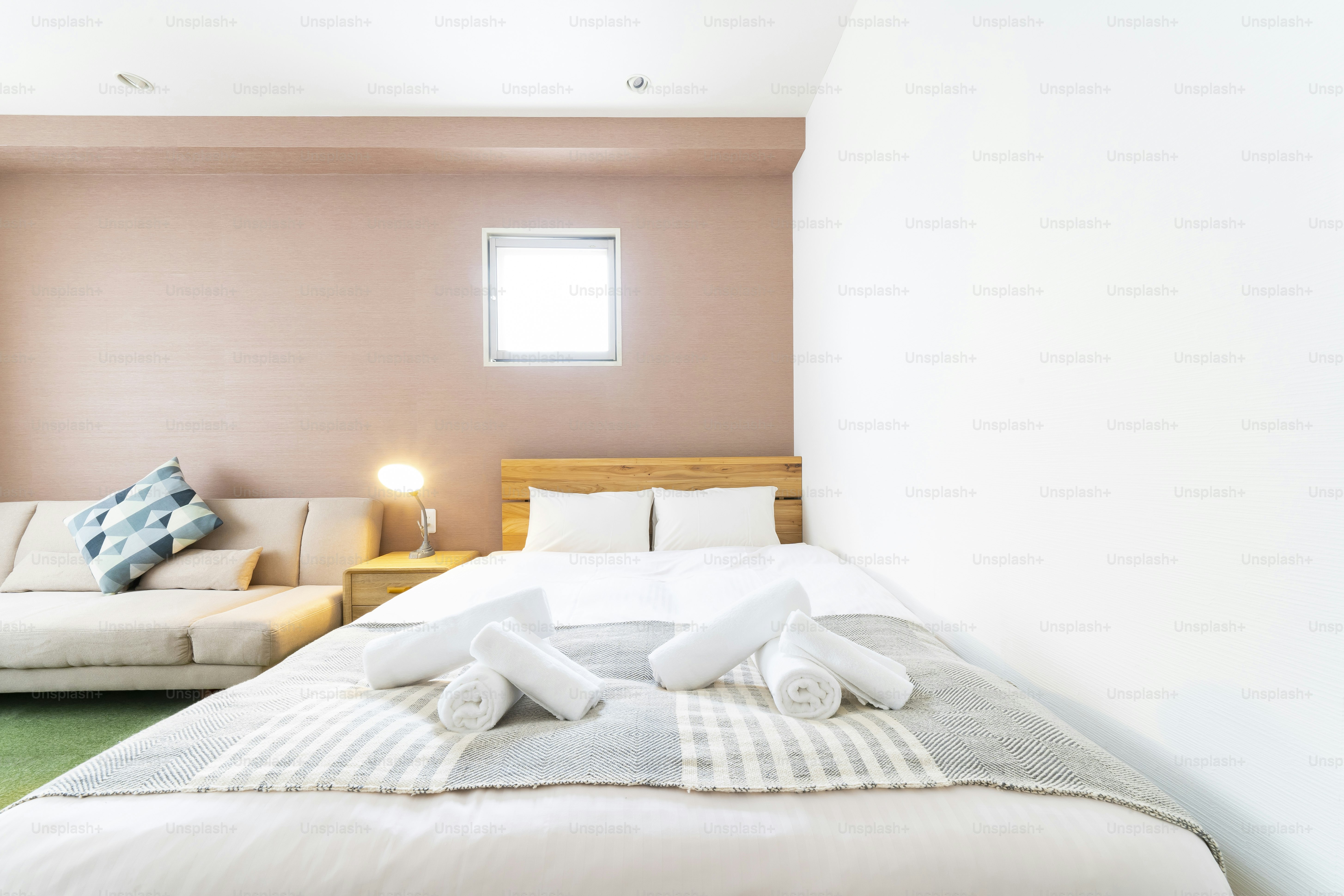 Bright bedroom with white sheets in the room