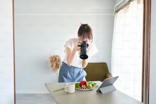 female photographer shooting in the room