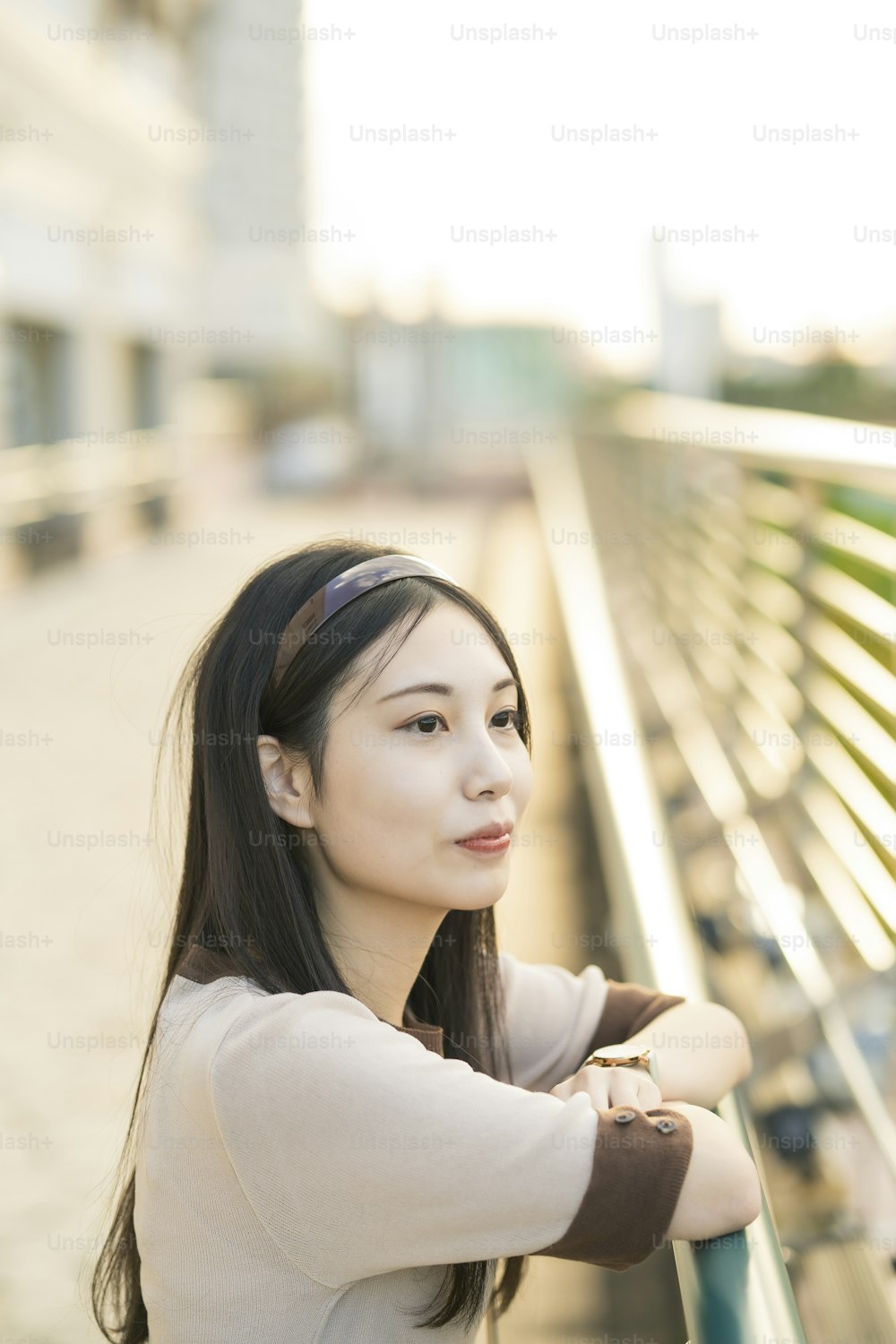 Outdoor portrait of a young Asian woman with black long hair