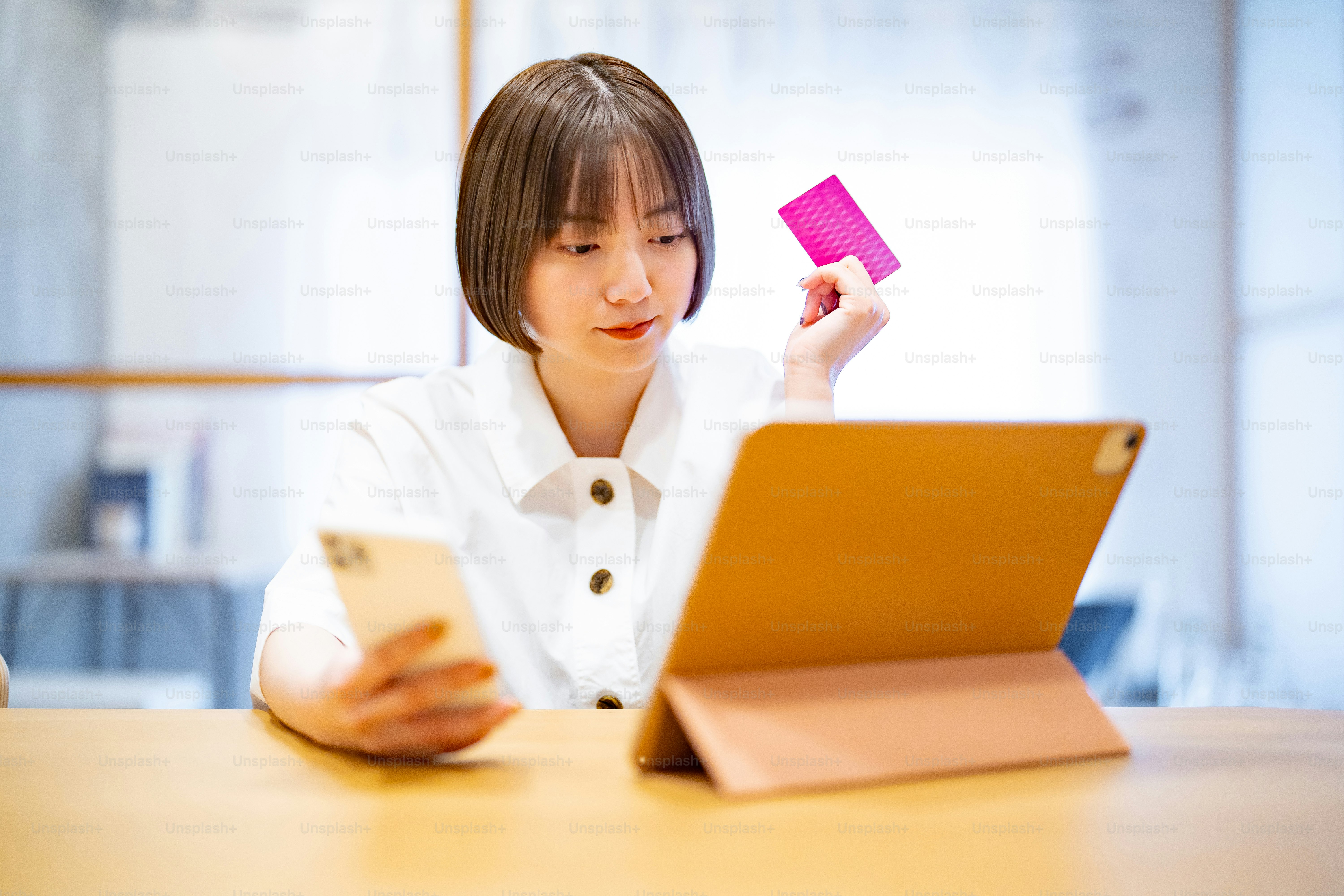 Female who makes card payments in online shopping