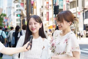 A woman undergoing a street interview