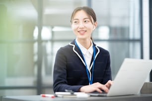 Asian young woman working in the office