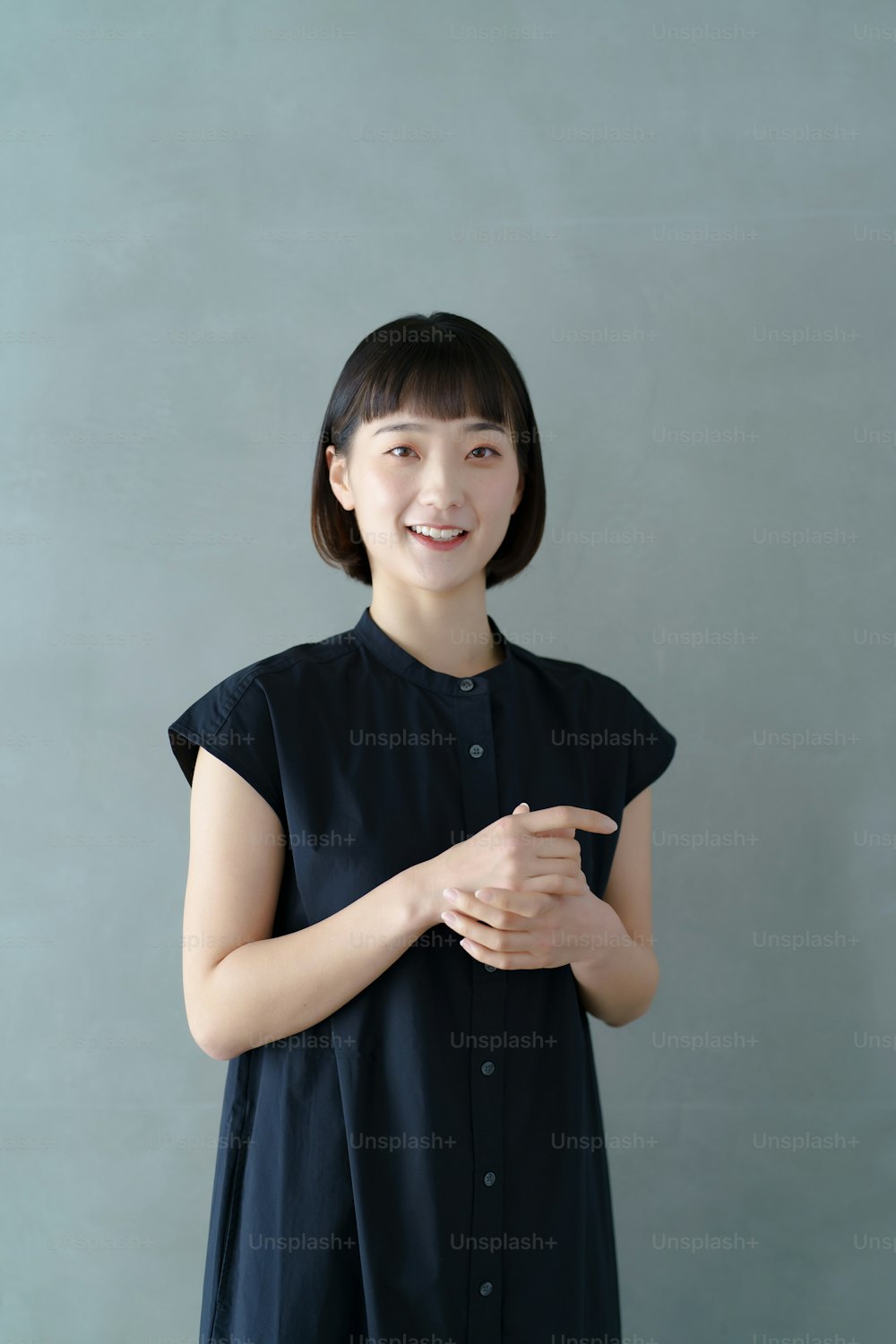 Portrait of a smiling young woman indoors