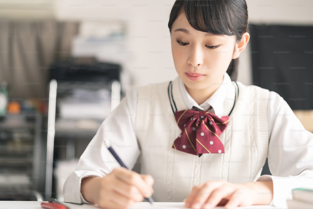 Studying asian school girl.