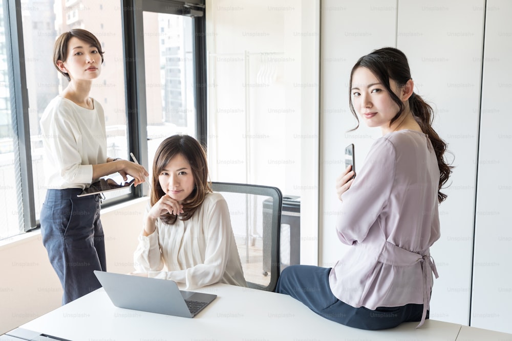 Young asian women working in the office.