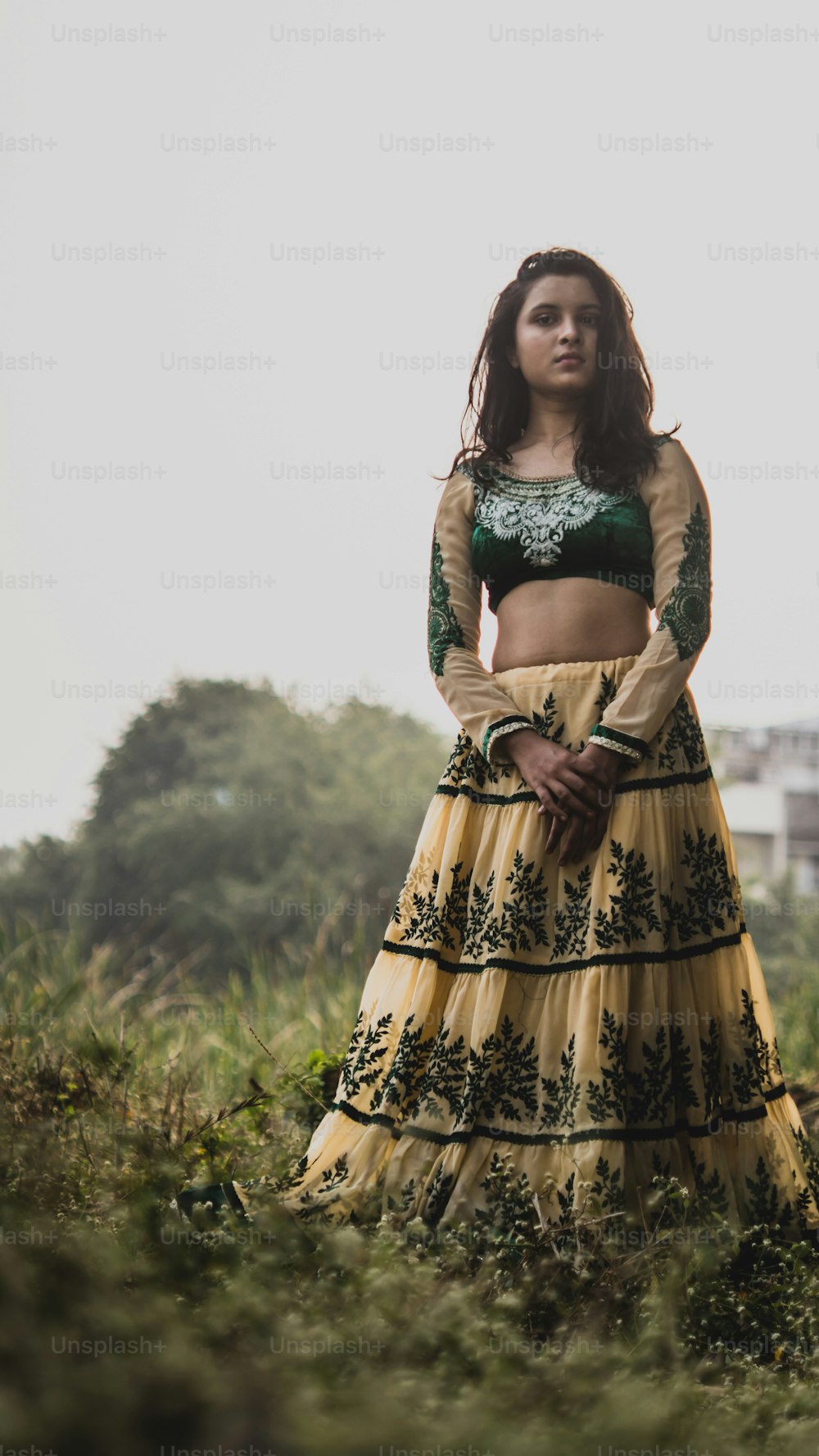 Portrait of beautiful Indian girl. Young hindu woman in traditional Indian costume lehenga choli or sari or saree