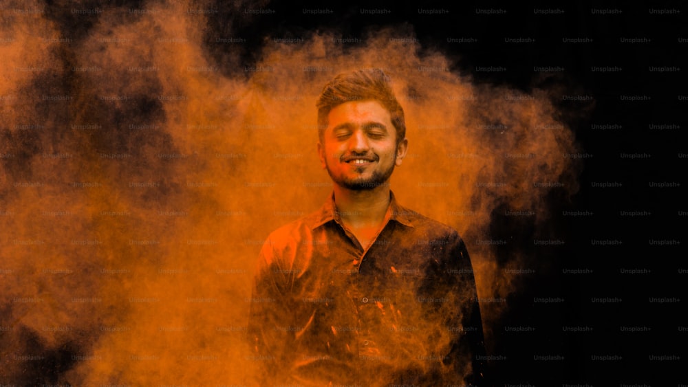 Young man in holi colors. holi is a festival of India. It is festival of colors and Joy. It is also called as Dhuleti.