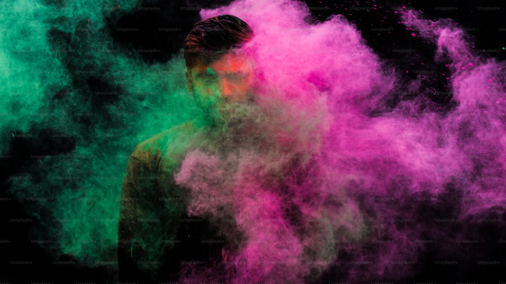 Young man in holi colors. holi is a festival of India. It is festival of colors and Joy. It is also called as Dhuleti.