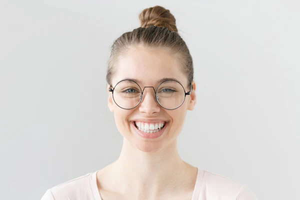 Cheerful woman showing confident beautiful smile