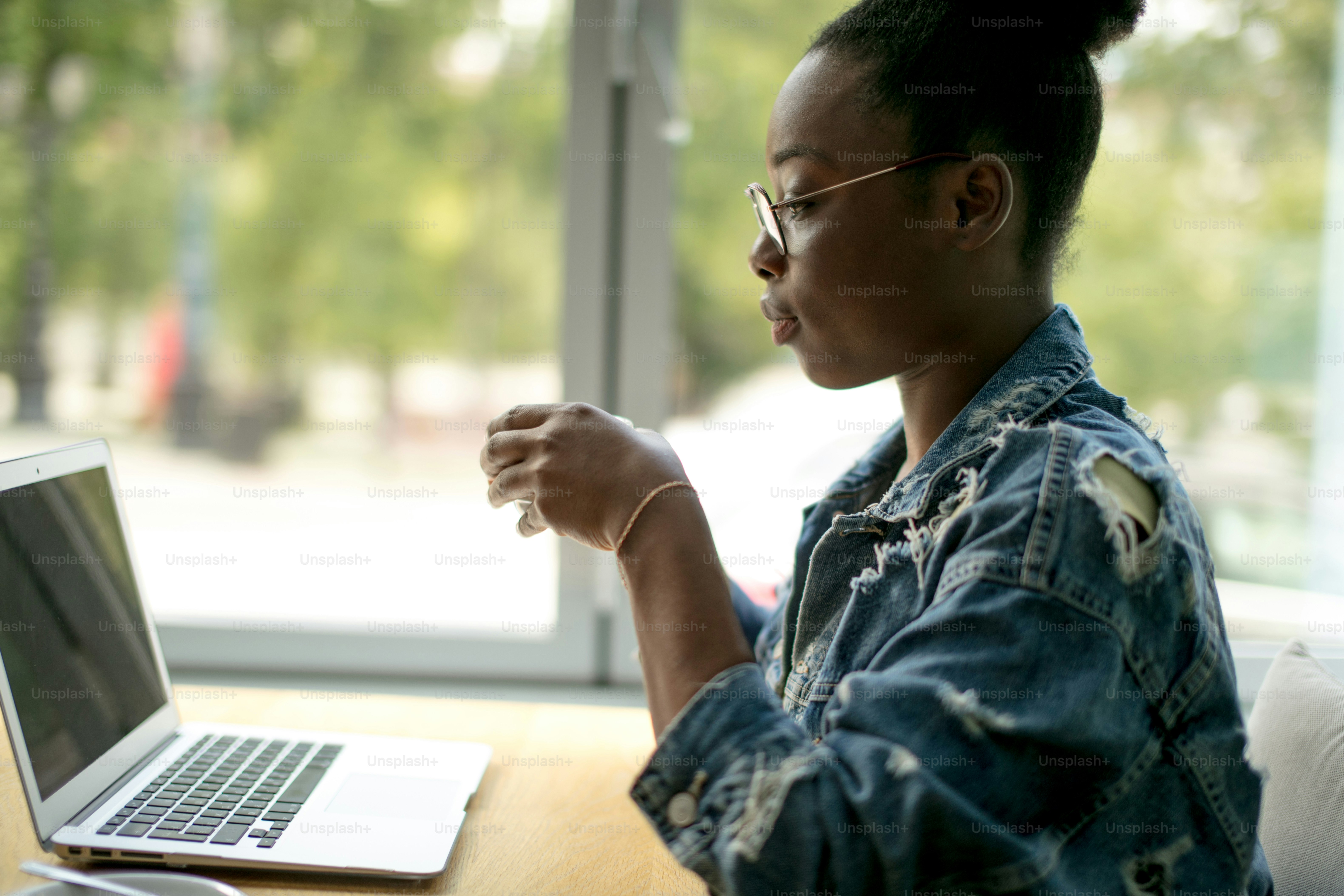 People, Technology and Leisure concept. Content African american woman  wearing glasses, drinking coffee from cup at home and watching the serial  on Woman s Hour. photo  Woman Image on Unsplash