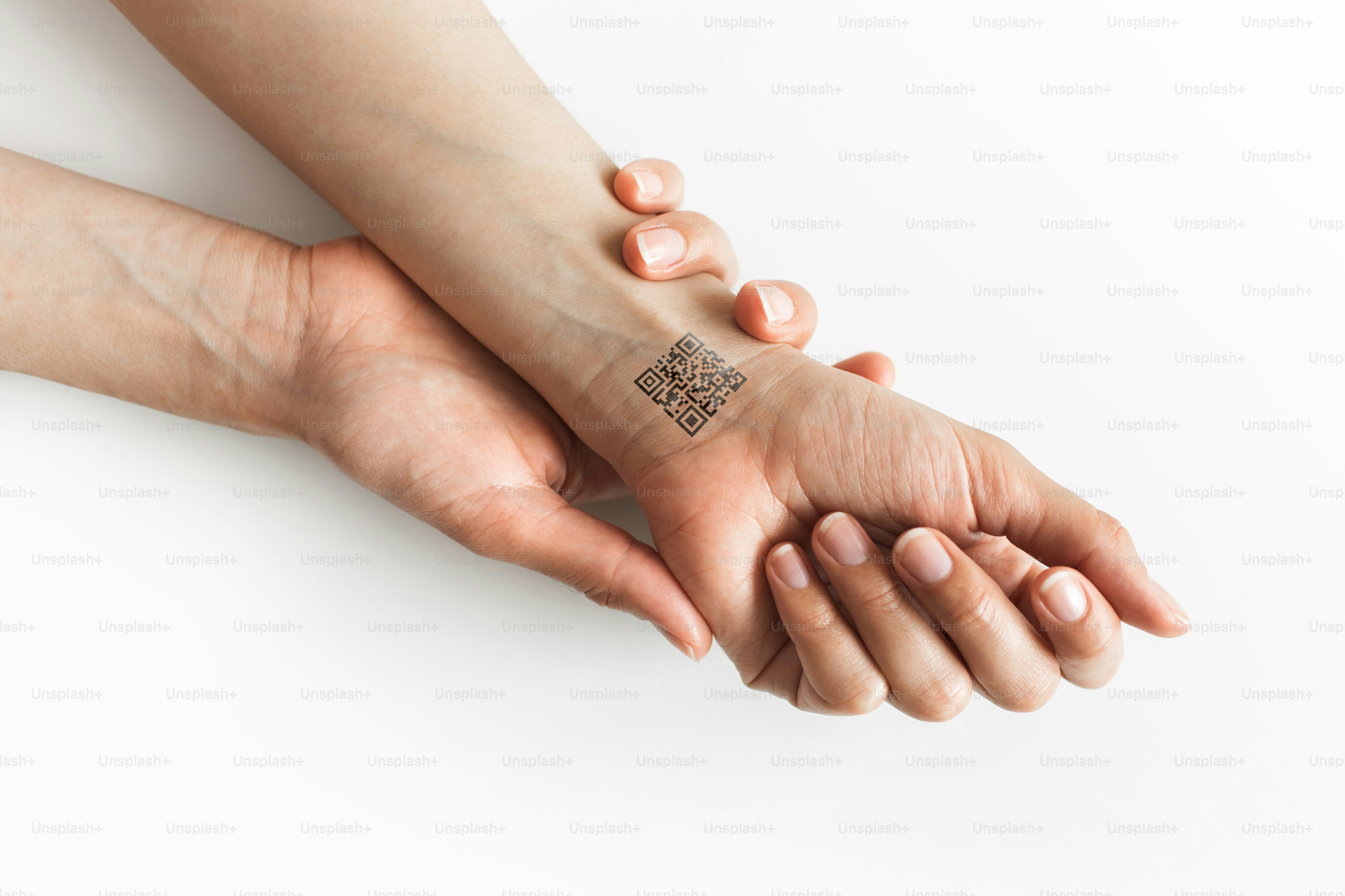 Hand with QR Code on wrist. Future of political population control ...