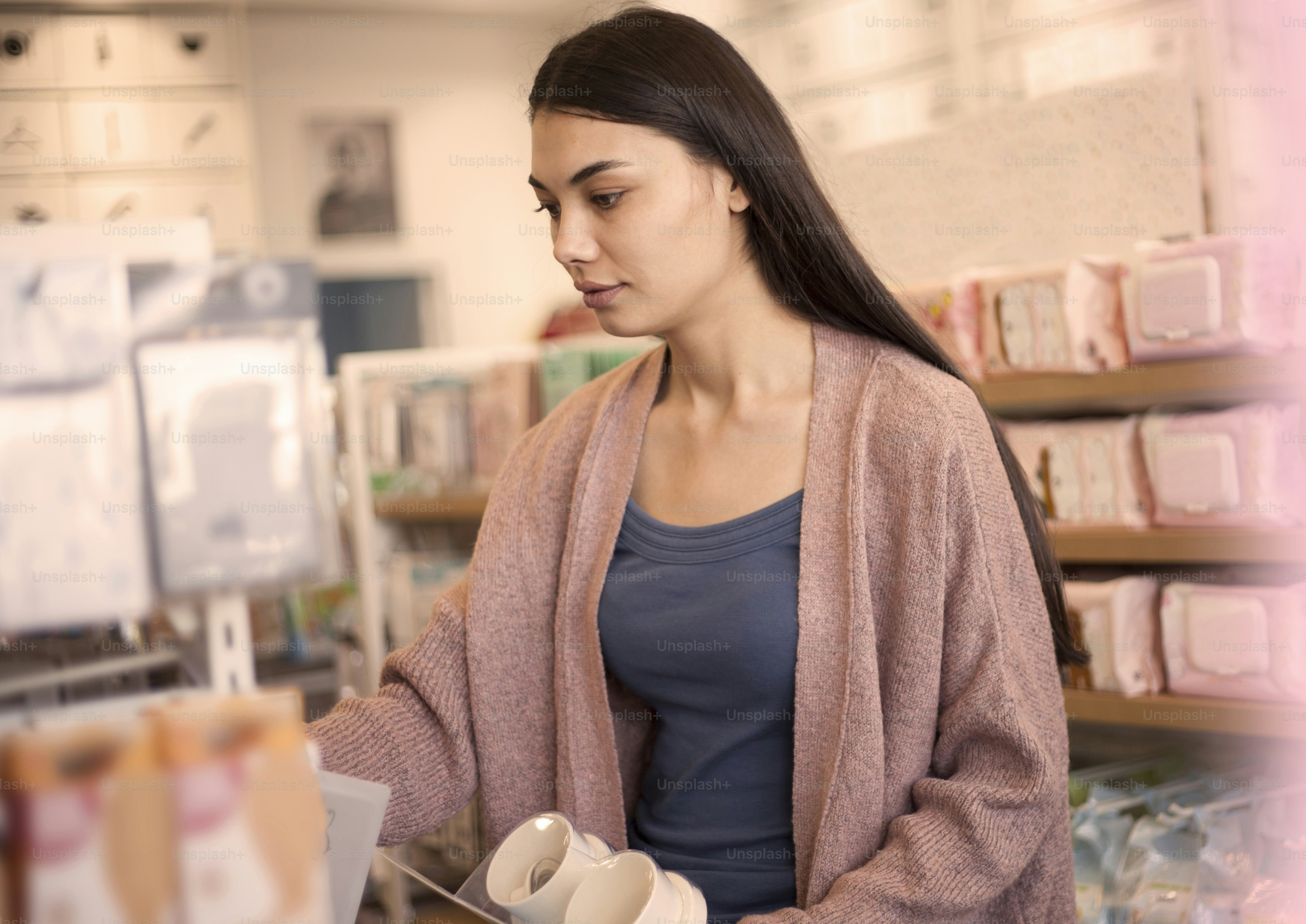 young beautiful woman shopping with credit card at shopping center