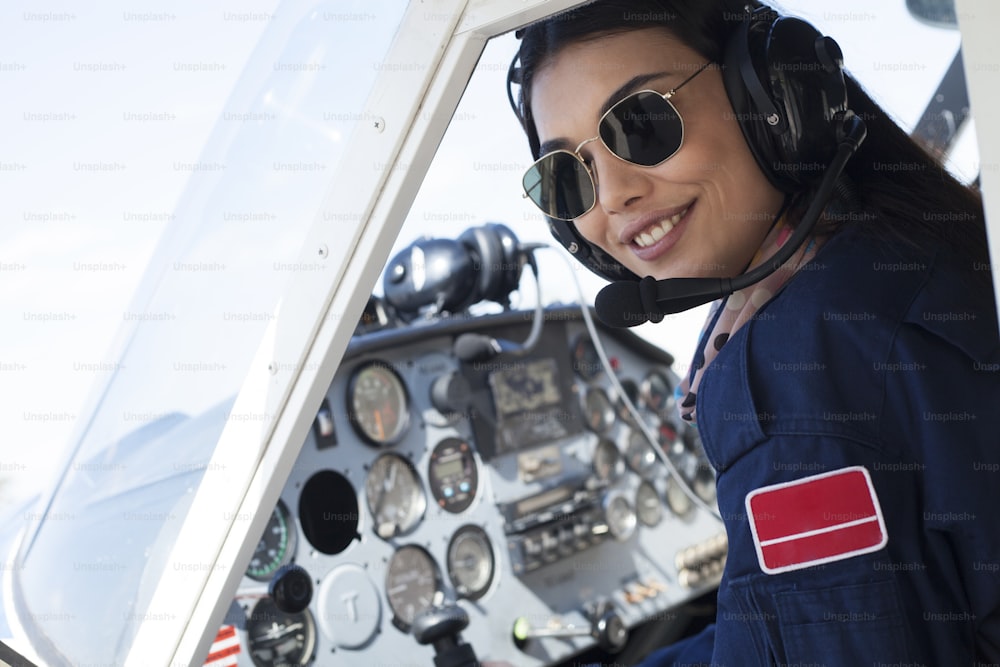 beautiful woman light airline pilot